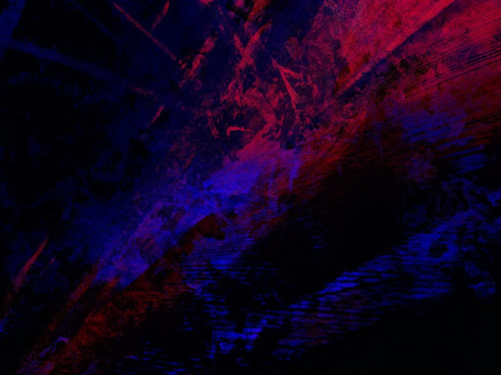 Dynamic abstract artwork showcasing bold red and blue colors with textured brush strokes.